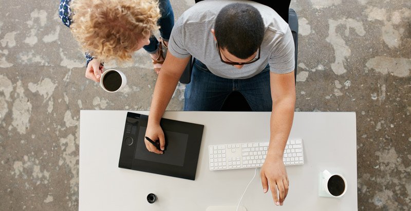 People working on a computer